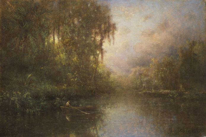 A person fishing from a small boat on calm Florida water surrounded by dense subtropical vegetation